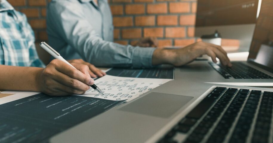 People Using the Best Self Storage Software for Small Business On Computers